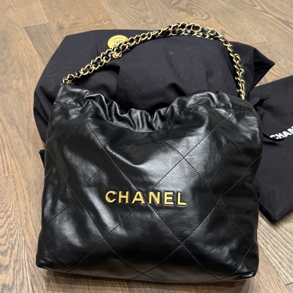 CHANEL Handbags - Chanel 22 small size Black Leather Shoulder Bag with Gold Chain